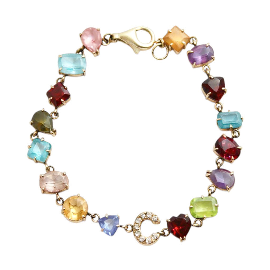 PULSERA CON INICIAL Y PIEDRAS DE NACIMIENTO