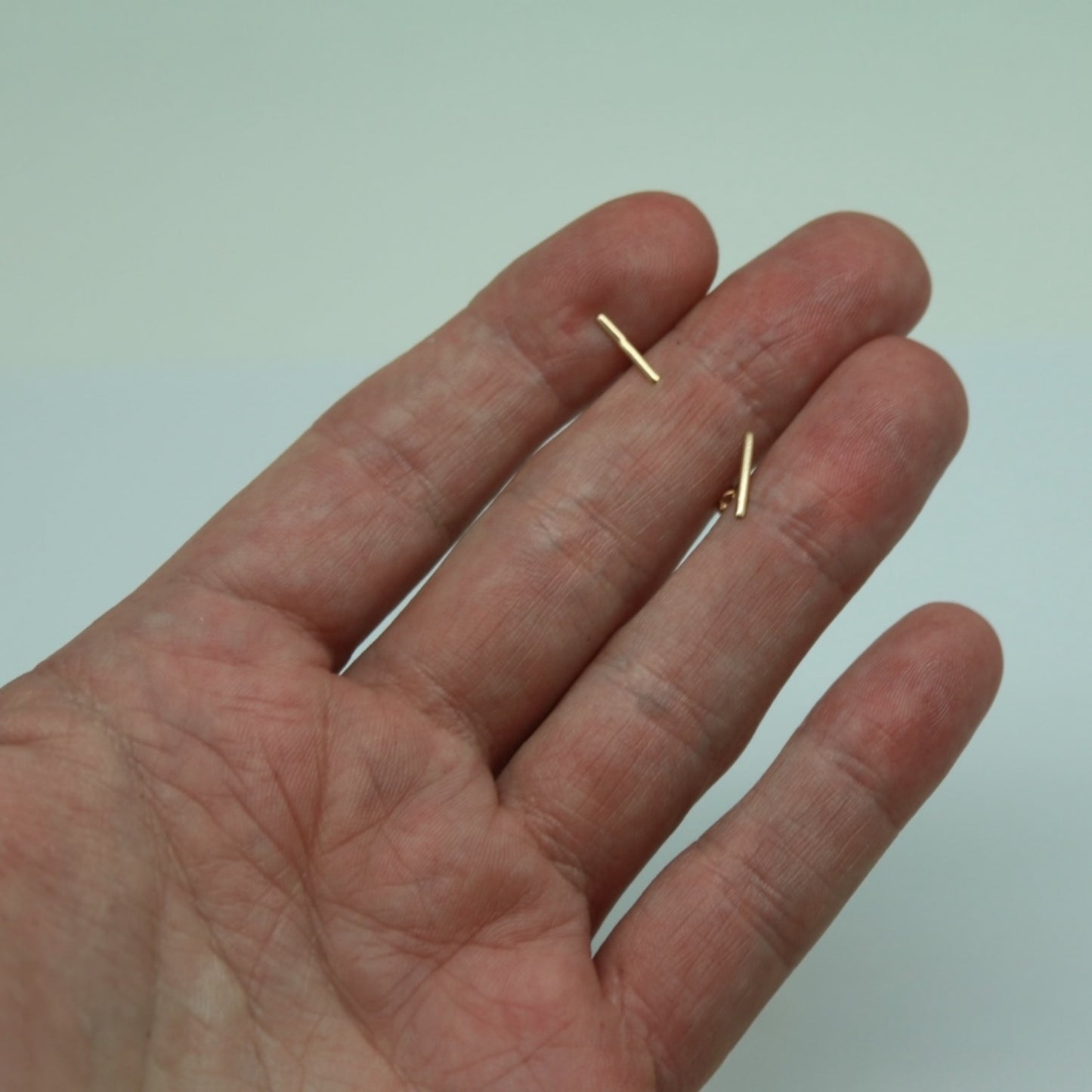 ARETES NIÑAS BARRA ORO