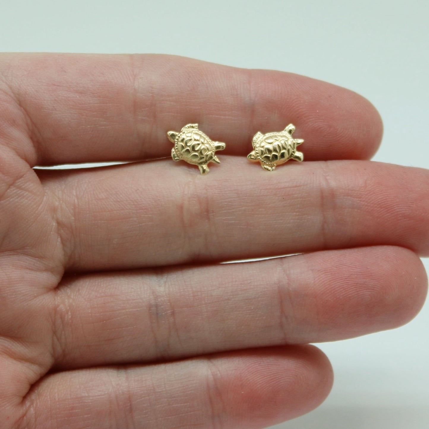 ARETES NIÑAS TORTUGA ORO