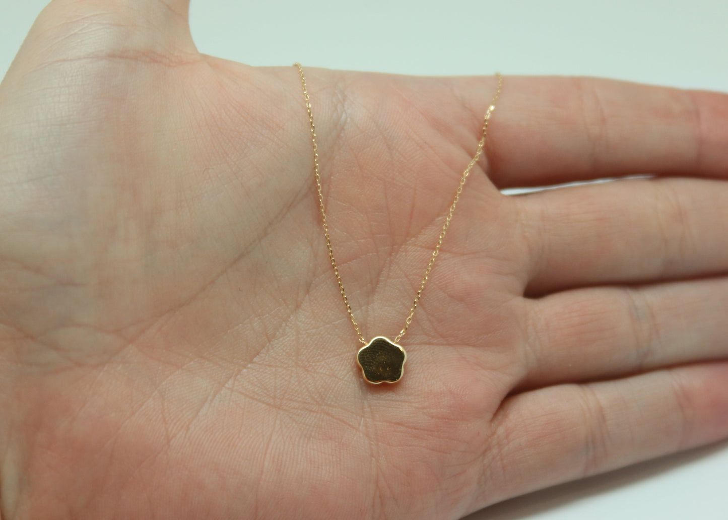 COLLAR FLOR ORO