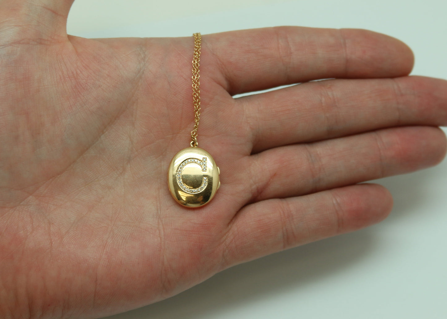 DIJE LOCKET INICIAL DIAMANTES