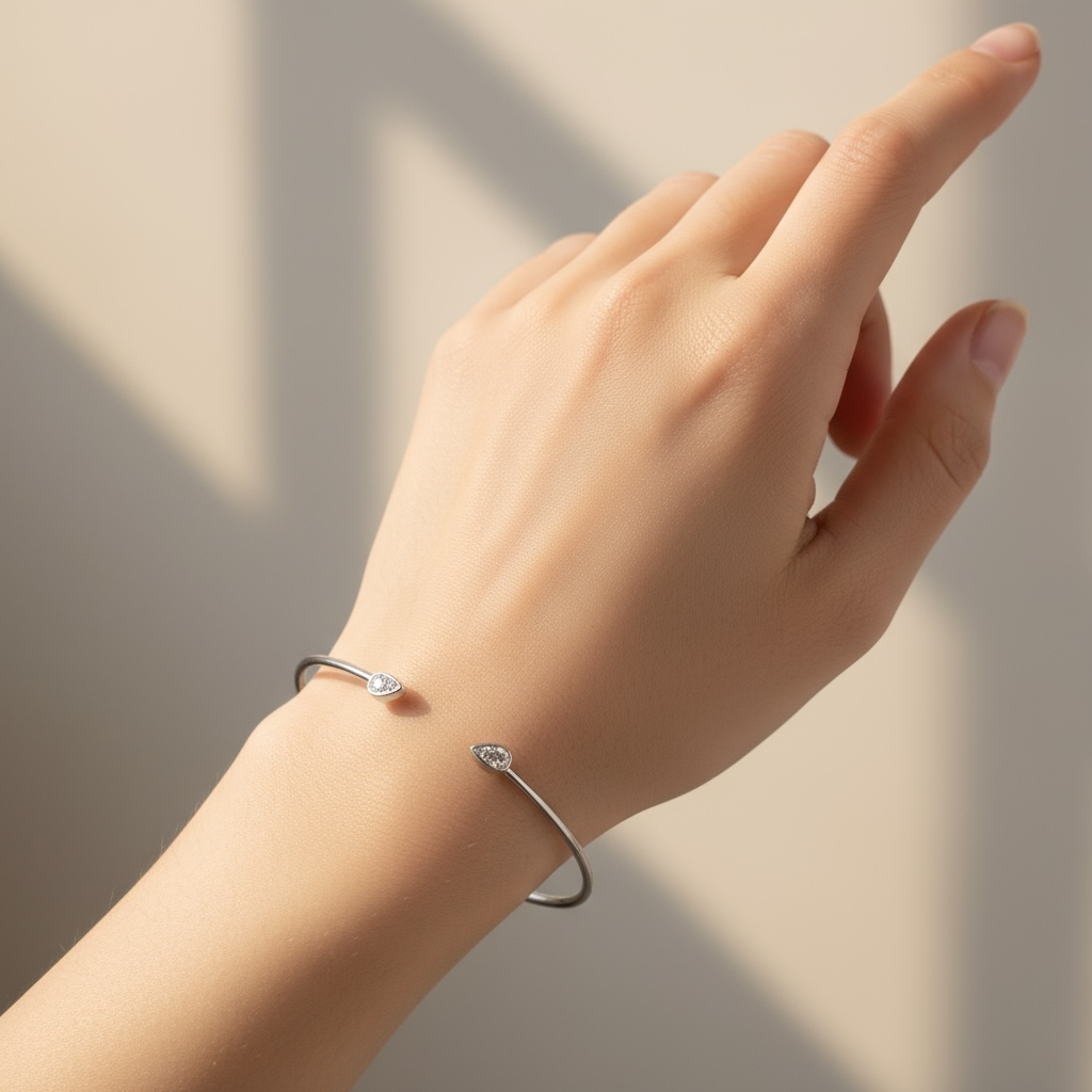 PULSERA RIGIDA ORO BLANCO GOTA