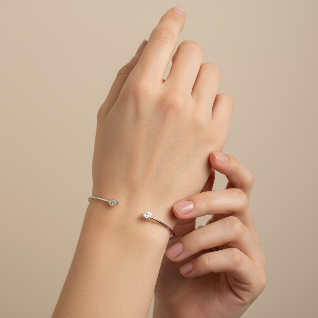 PULSERA RIGIDA ORO BLANCO GOTA