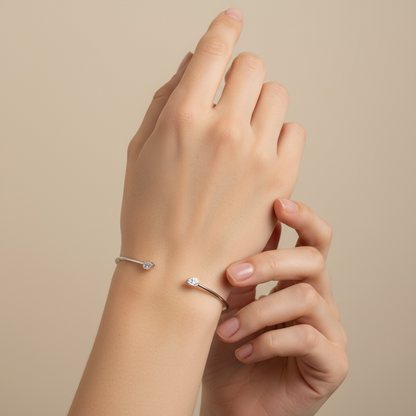 PULSERA RIGIDA ORO BLANCO GOTA