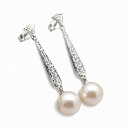 ARETES LARGOS PERLA Y DIAMANTES