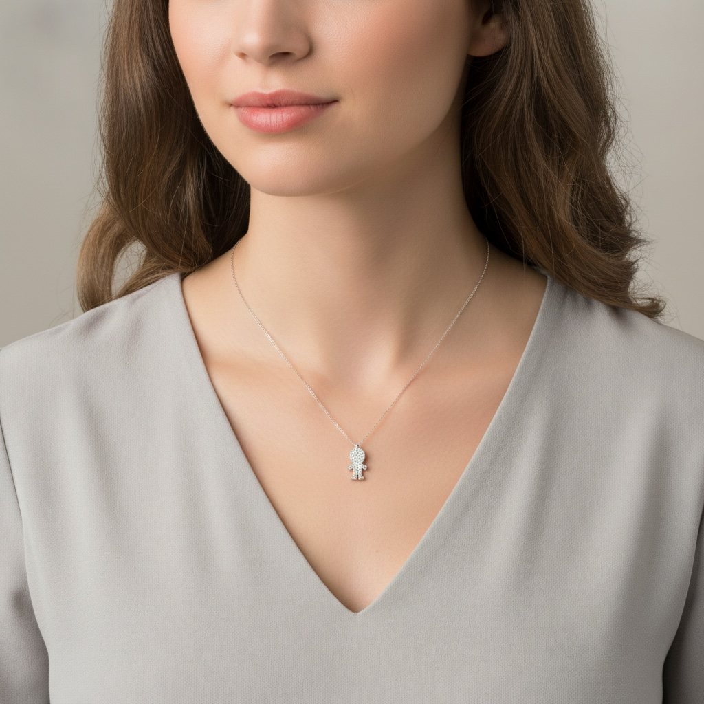 DIJE MUÑECO ORO Y DIAMANTES