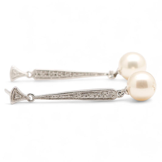 ARETES LARGOS PERLA Y DIAMANTES