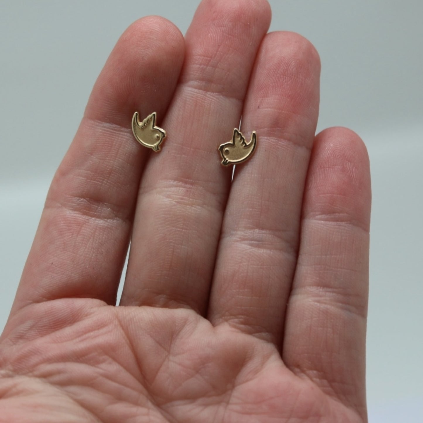 ARETES NIÑAS ORO PAJARO