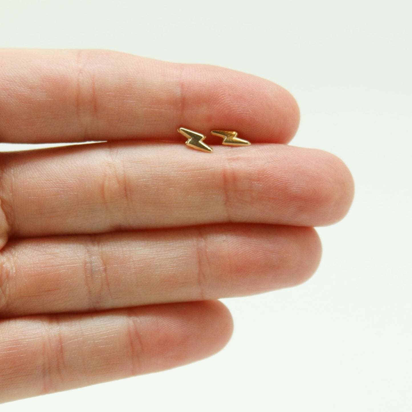 ARETES NIÑAS RAYO ORO