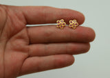 ARETES FLOR RUBI