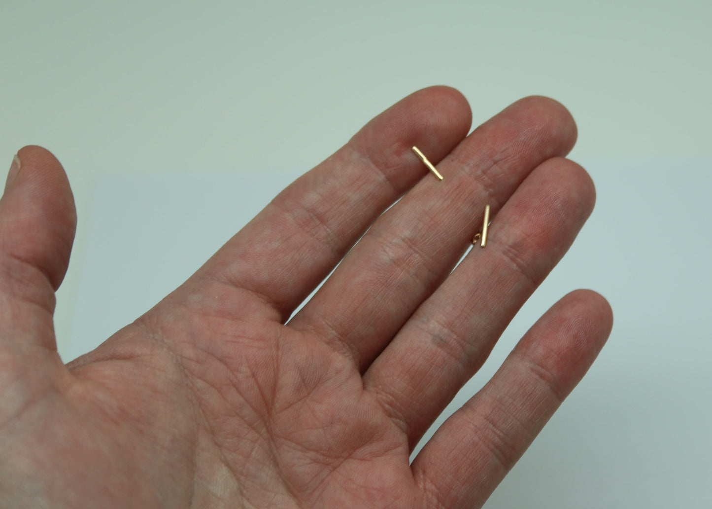 ARETES NIÑAS BARRA ORO